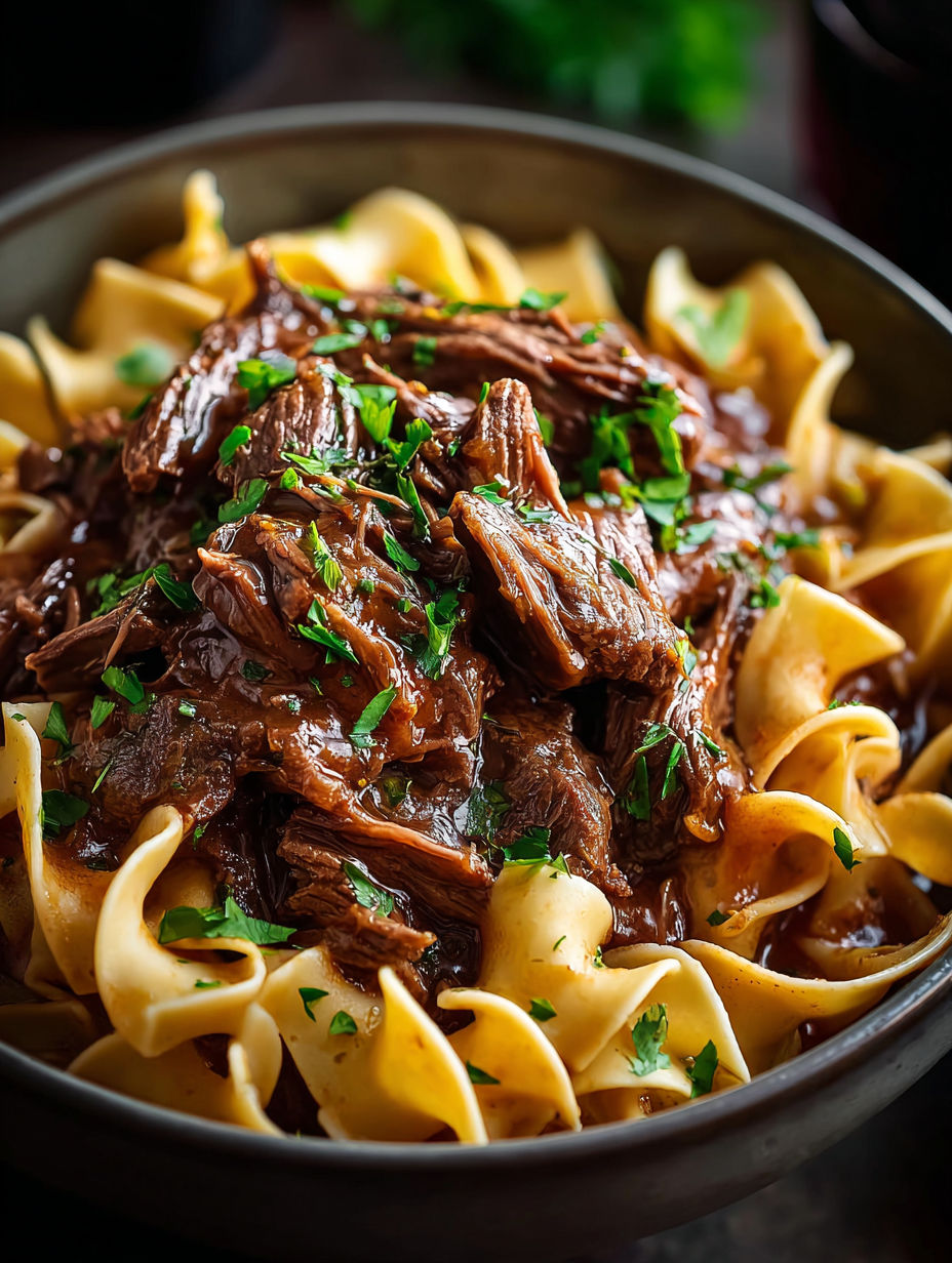 A bowl of beef and noodles.