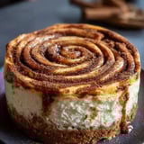 A slice of cake with a swirl pattern.