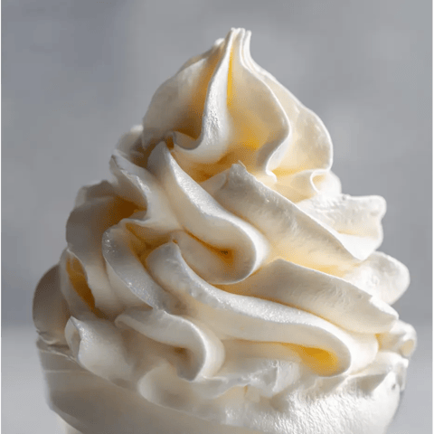 A white frosted dessert.